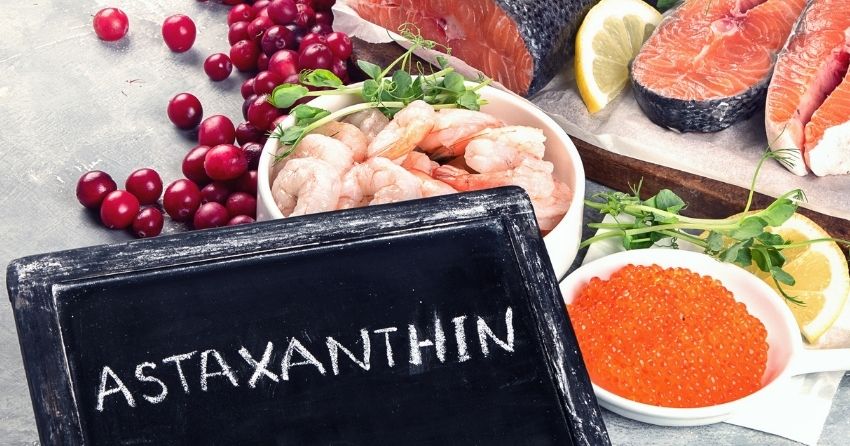 Astaxanthin is a fat-soluble carotenoid pigment, providing certain animals with their pink or red colorings, including salmon, trout, krill, shrimp, crab, and lobster