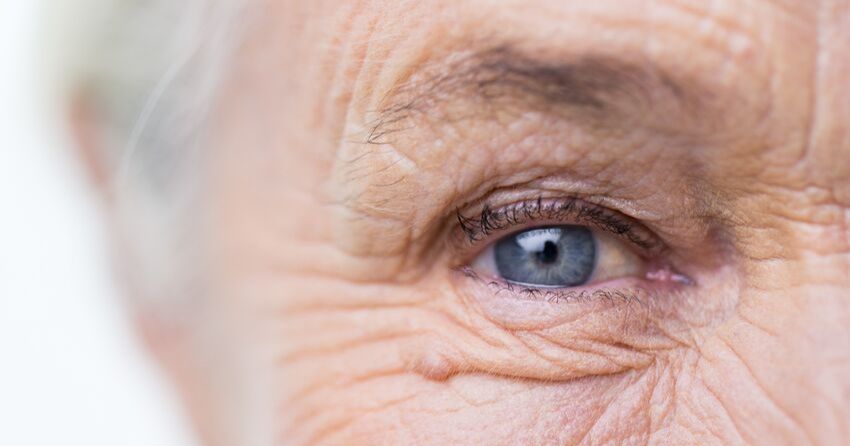 senior woman close up of eye