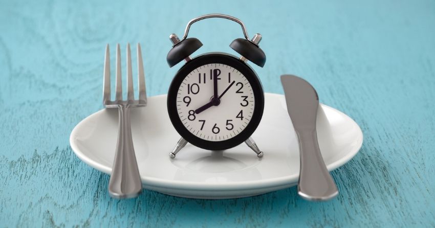 intermittent fasting clock on plate