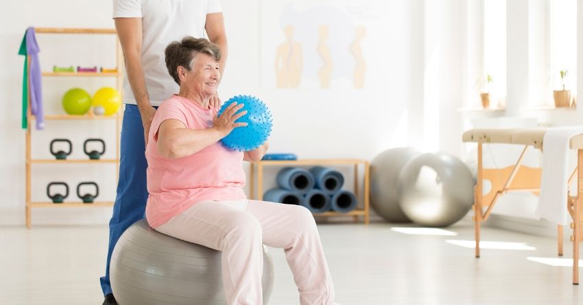 senior woman on exercise stability ball