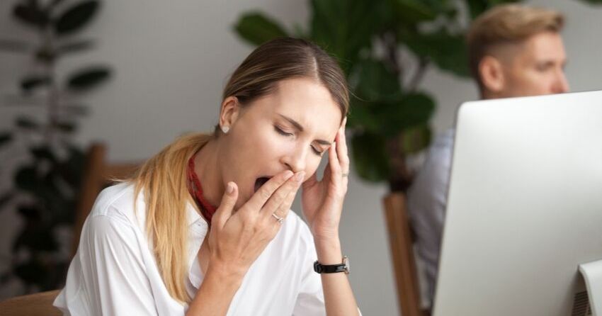 tired woman yawning
